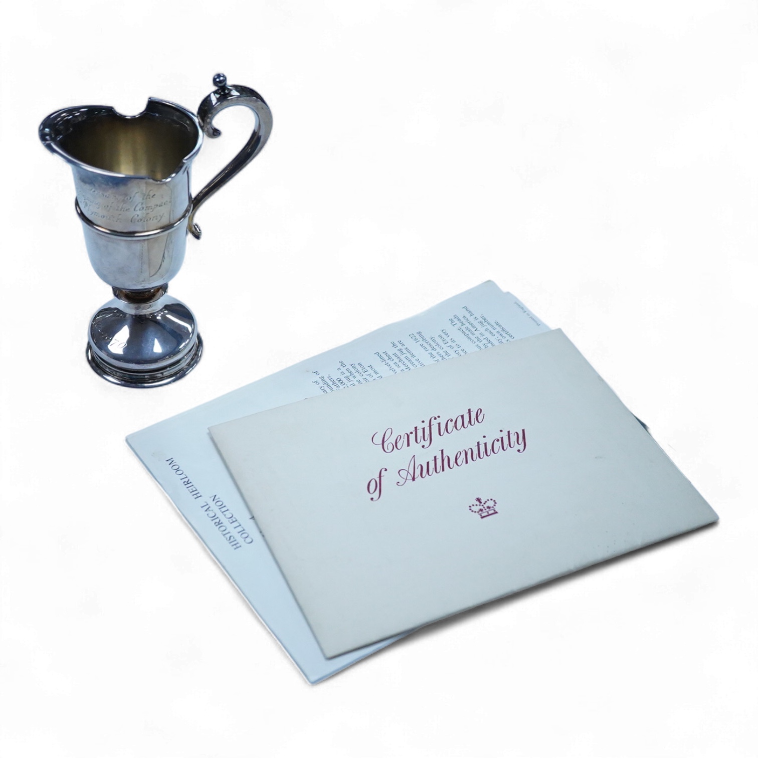 An Elizabeth II silver limited edition 'Mayflower' commemorative jug, maker P. Ltd, London. 1969, with engraved inscription and certificate of authenticity, no. 188/2000, height 14cm, 7.7oz.